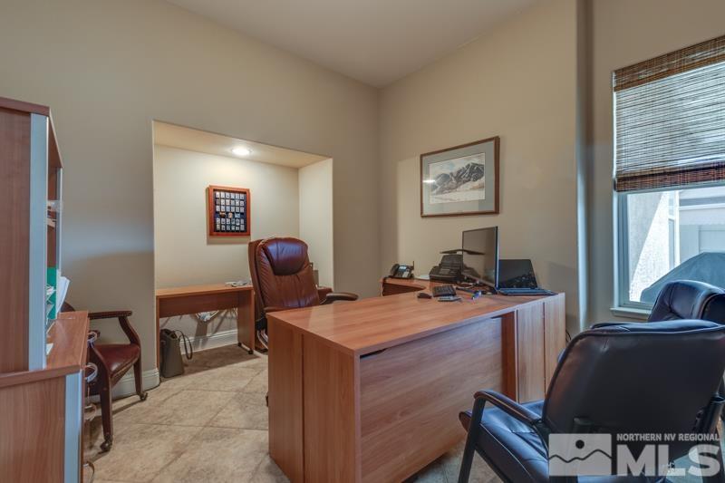 1696 Ghettis Way Reno, NV 89521 - Photo 13 of 25 a work room with furniture and gym equipment