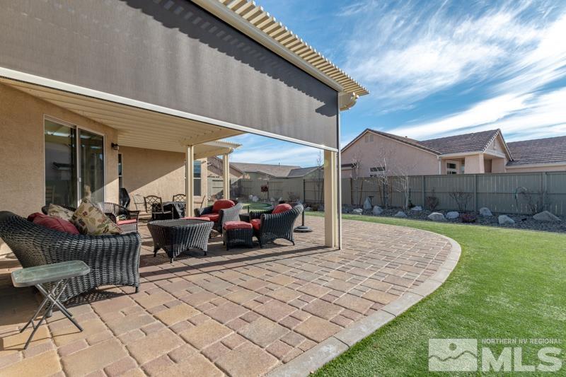 1696 Ghettis Way Reno, NV 89521 - Photo 22 of 25 a view of a house and couches in patio