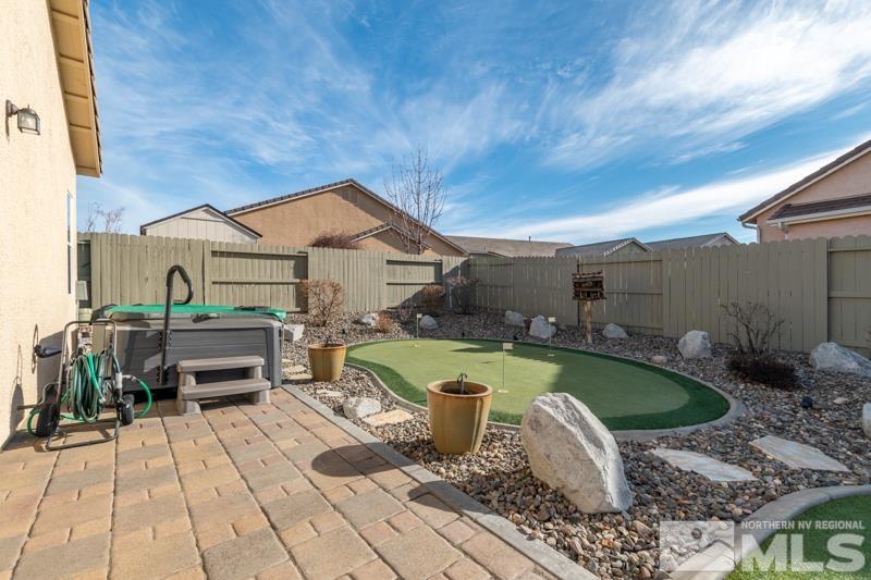1696 Ghettis Way Reno, NV 89521 - Photo 23 of 25 a view of a swimming pool with a patio