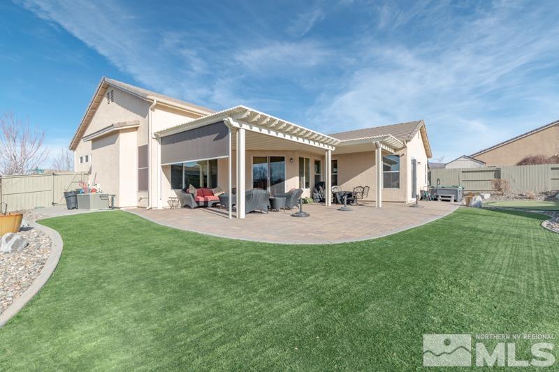 1696 Ghettis Way Reno, NV 89521 - Photo 25 of 25 a view of a house with a yard porch and furniture