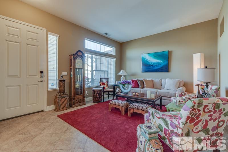 1696 Ghettis Way Reno, NV 89521 - Photo 3 of 25 a living room with furniture and a rug