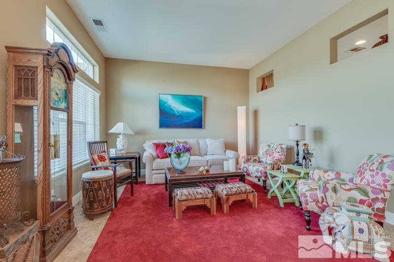 1696 Ghettis Way Reno, NV 89521 - Photo 4 of 25 a living room with furniture and a wooden floor