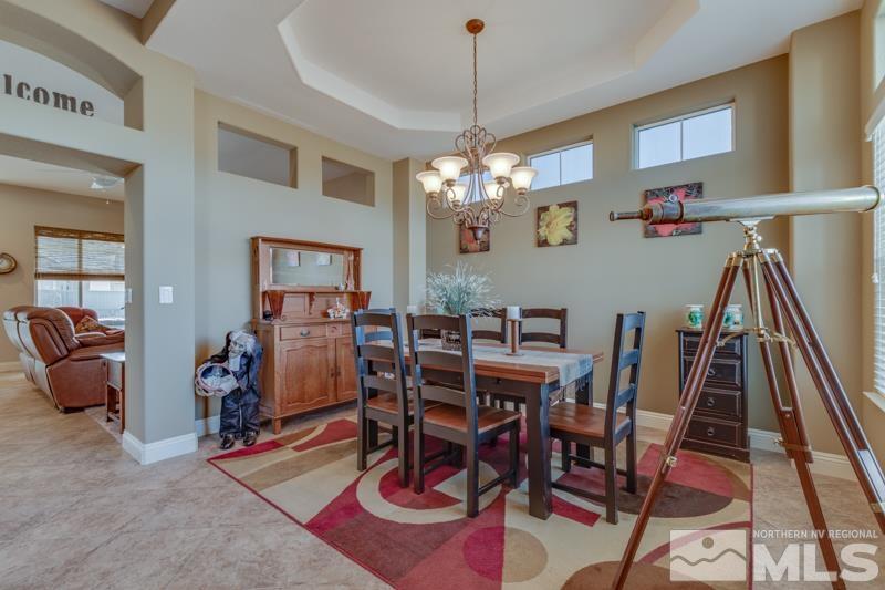 1696 Ghettis Way Reno, NV 89521 - Photo 6 of 25 a view of a dining room with furniture