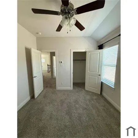 a view of a refrigerator in a kitchen