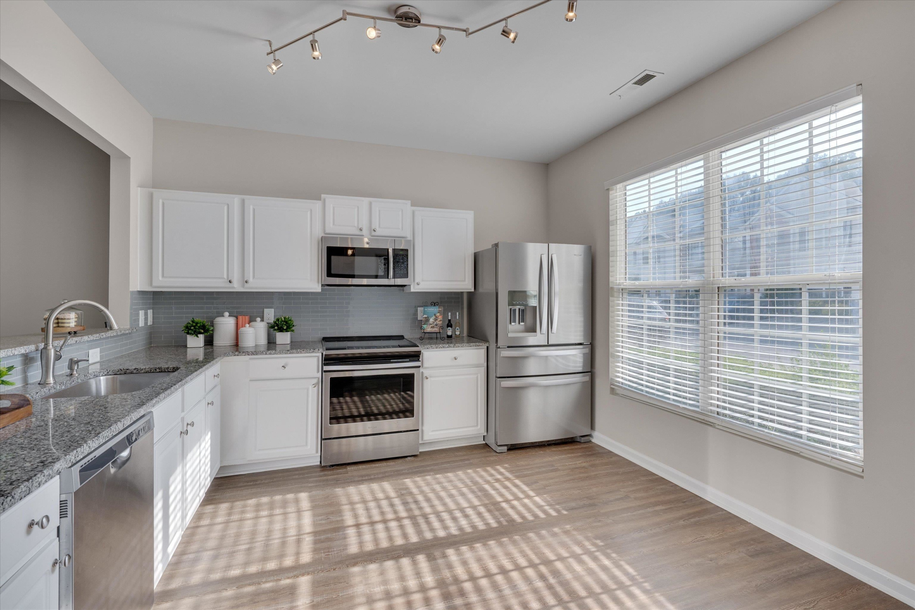 5101 Echo Ridge Road Raleigh, NC 27612 - Photo 5 of 27 Room for eat in kitchen and lots of natural light! Kitchen