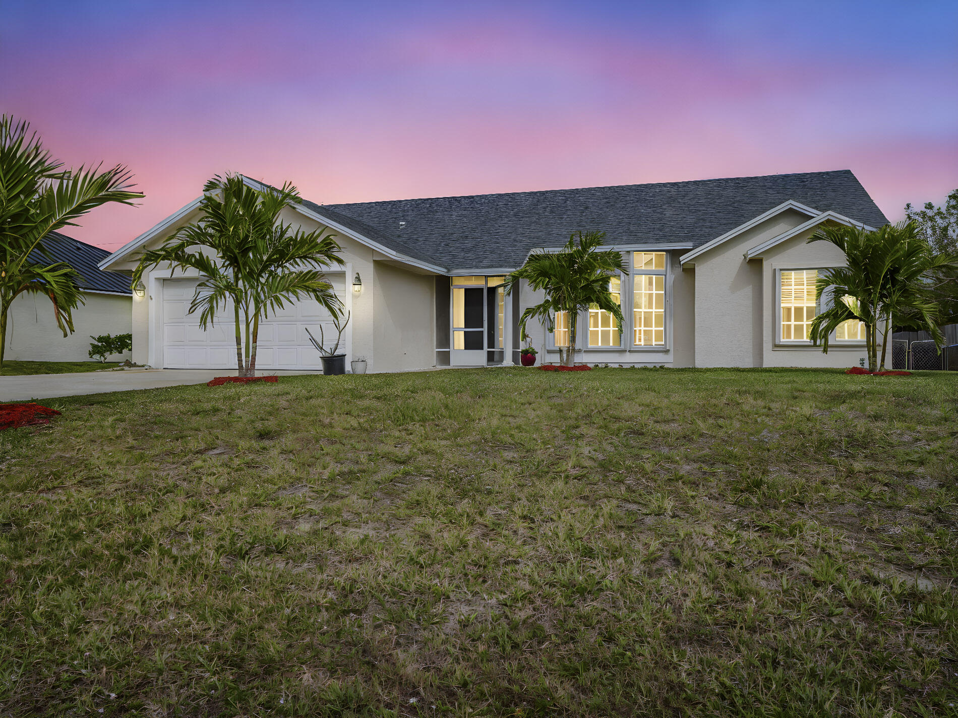 737 Southwest Ancona Road Port St. Lucie, FL 34953 - Photo 2 of 28 4 - Day To Dusk - Dusk - 0