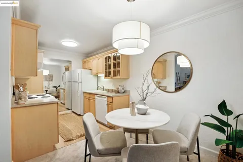 a kitchen with a sink stove and refrigerator