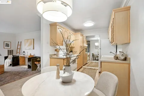 a kitchen with a sink cabinets and appliances