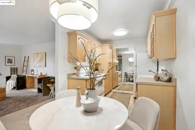 a kitchen with a sink cabinets and appliances