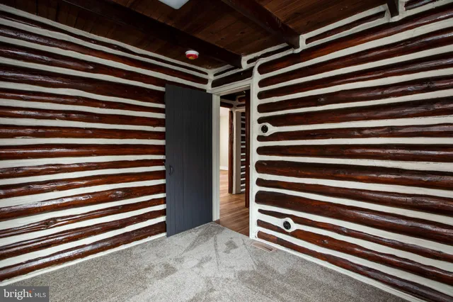 a view of room and front door