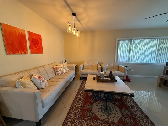 a living room with furniture and a couch