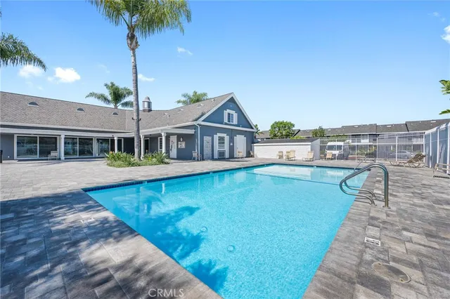 a view of a house with a swimming pool