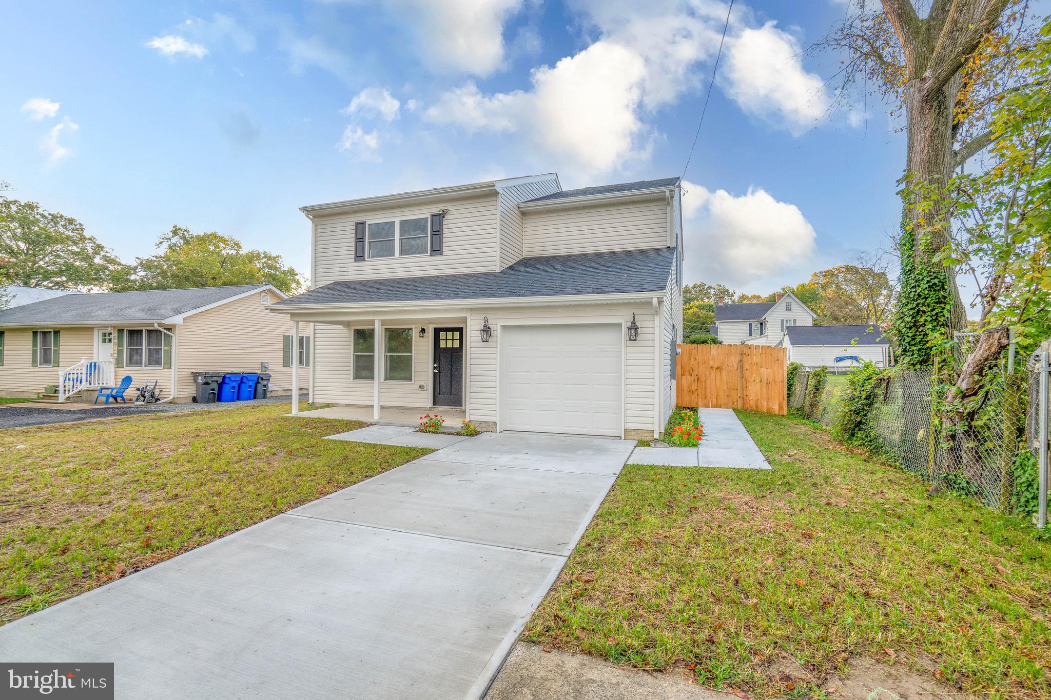 308 Gray Street Townsend, DE 19734 - Photo 2 of 33 a front view of house with yard and green space