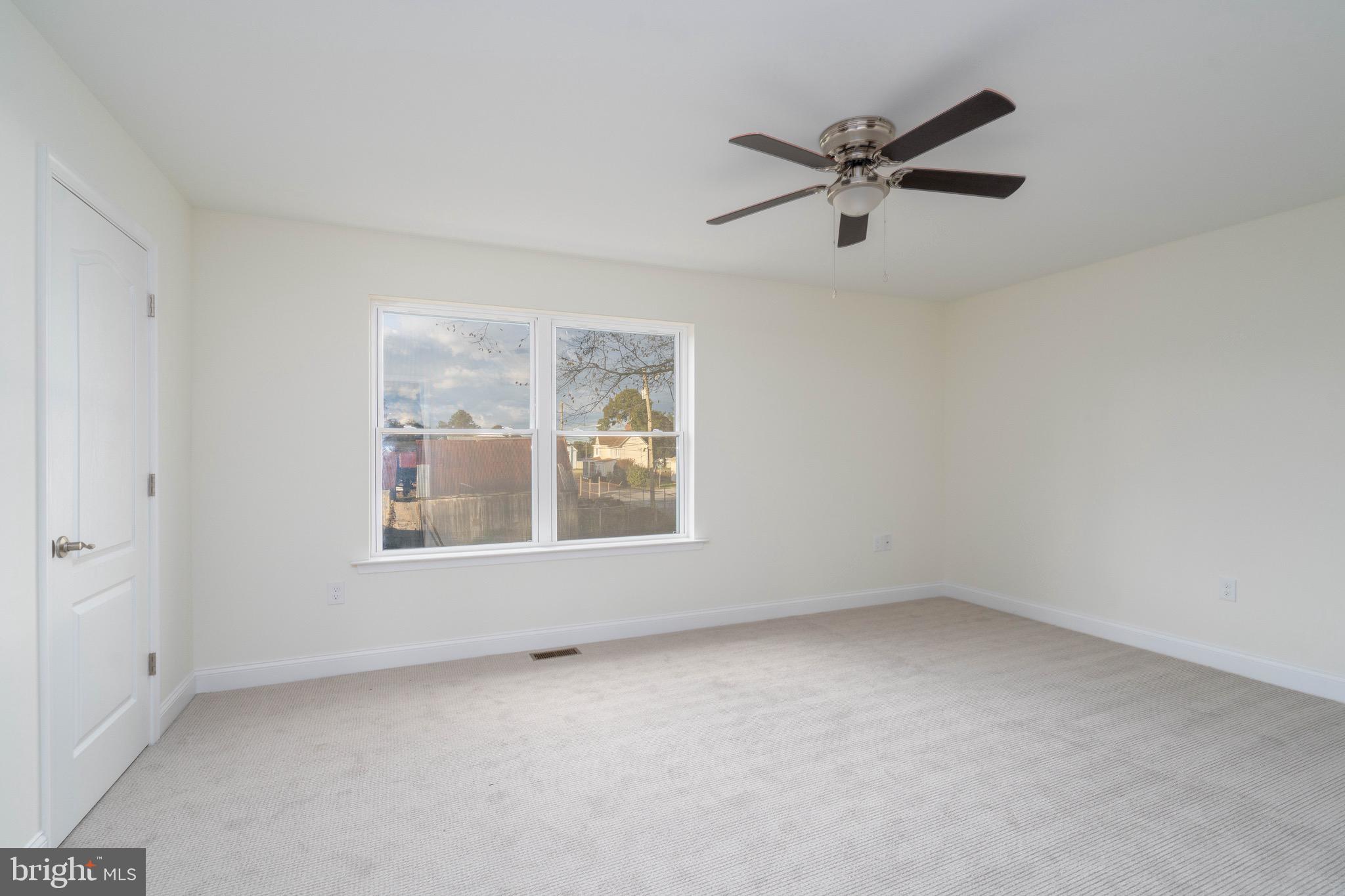 308 Gray Street Townsend, DE 19734 - Photo 21 of 33 an empty room with a window