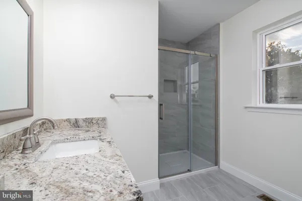 a bathroom with a toilet and a sink