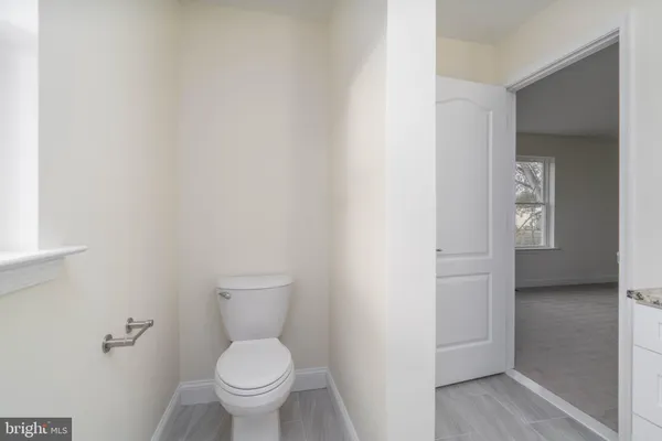 a view of empty room with windows