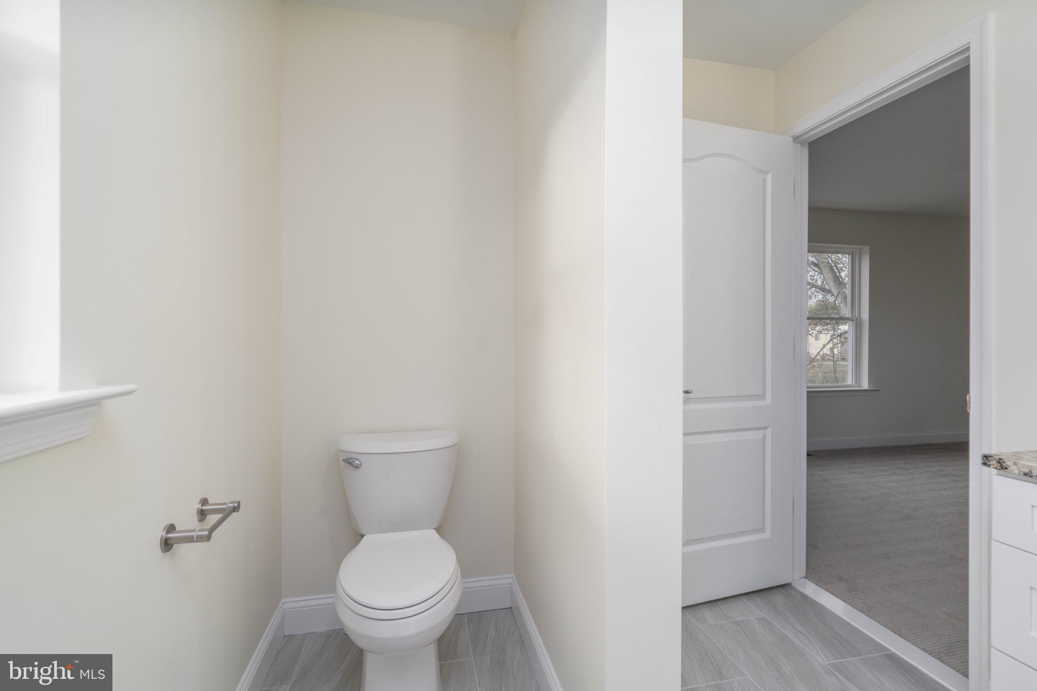 308 Gray Street Townsend, DE 19734 - Photo 24 of 33 a bathroom with a toilet and a sink