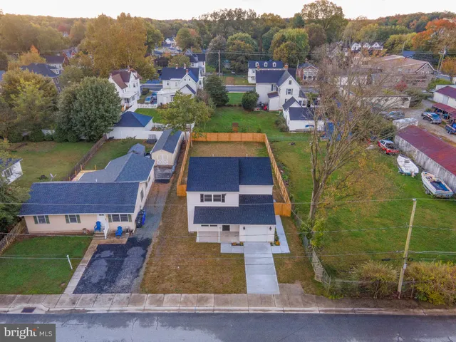 an aerial view of residential house with outdoor space