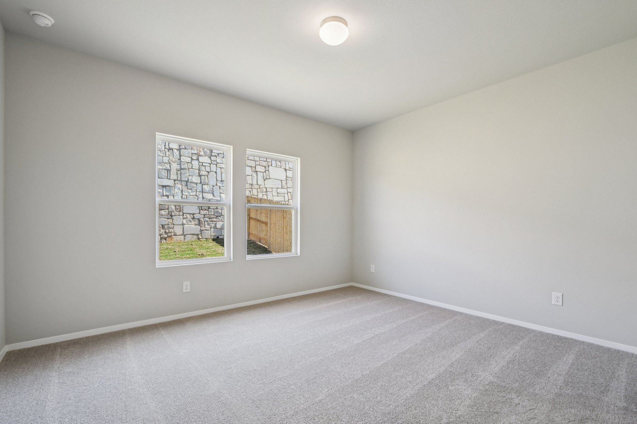 11913 Ellena Cove Austin, TX 78747 - Photo 14 of 35 an empty room with windows