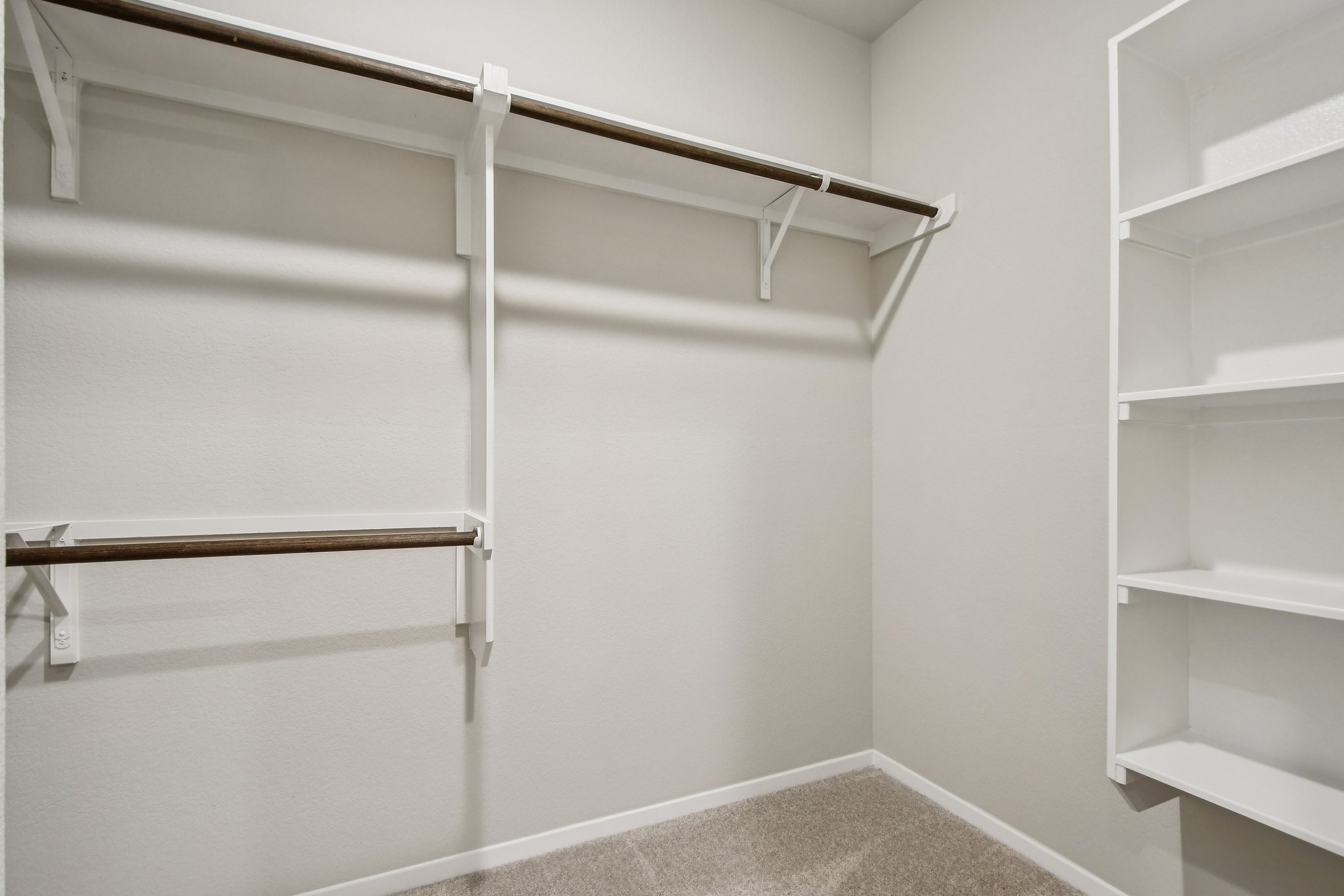 11913 Ellena Cove Austin, TX 78747 - Photo 18 of 35 a view of an empty walk in closet
