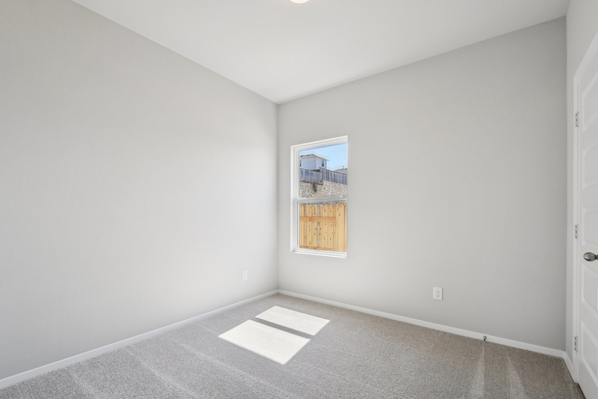 11913 Ellena Cove Austin, TX 78747 - Photo 19 of 35 an empty room with a window
