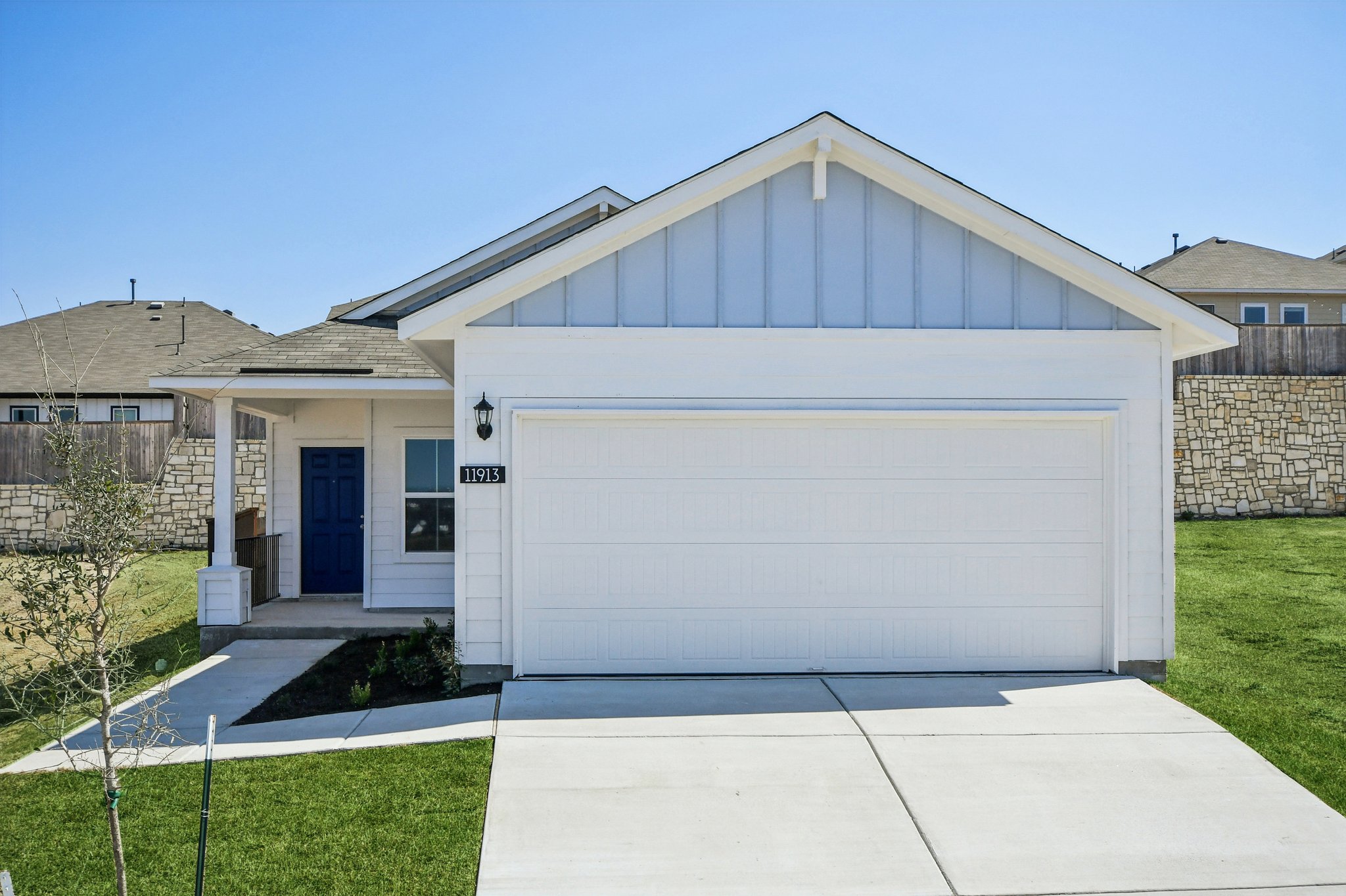 11913 Ellena Cove Austin, TX 78747 - Photo 2 of 35 a house view with a sink and a yard