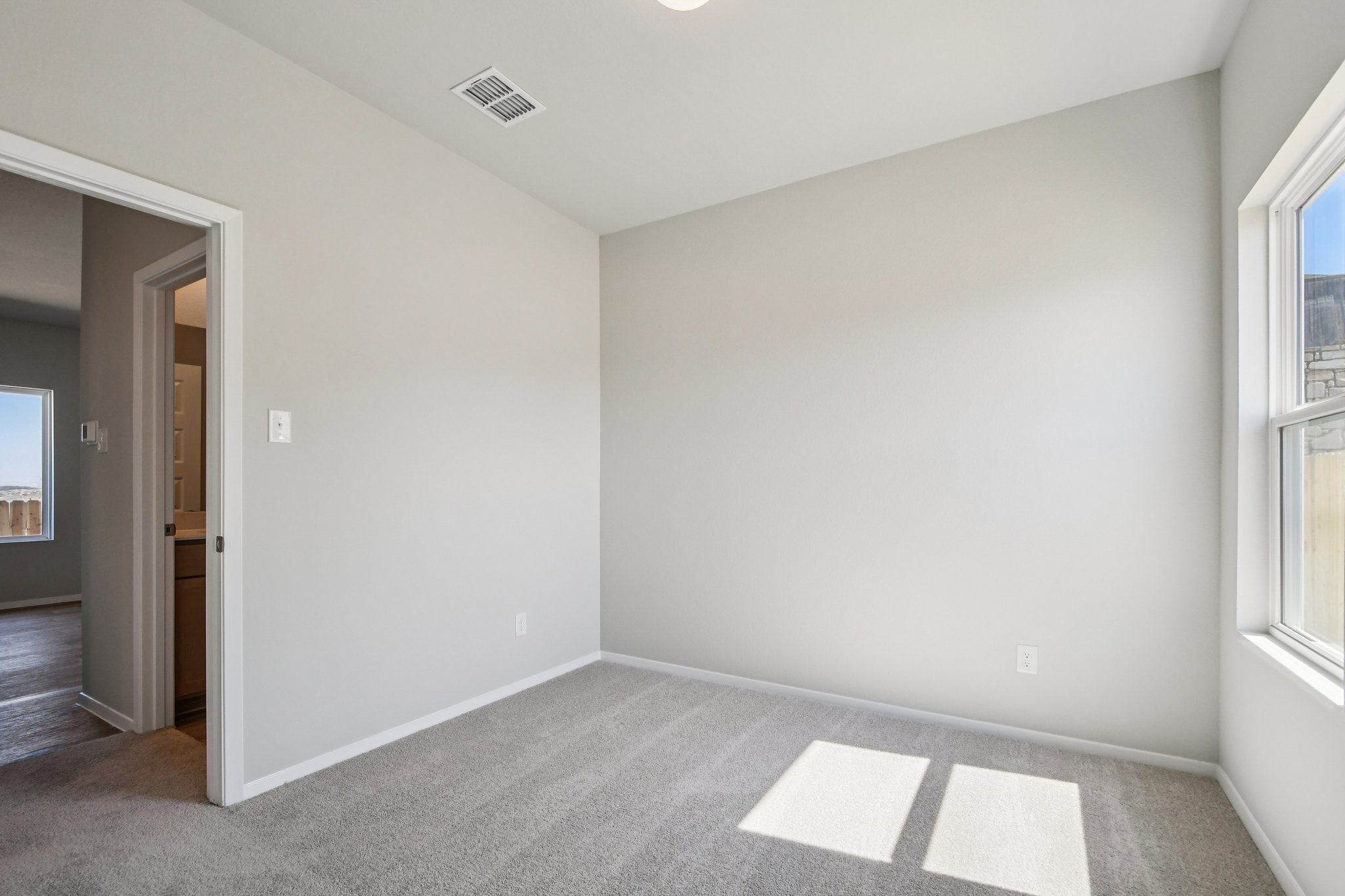 11913 Ellena Cove Austin, TX 78747 - Photo 21 of 35 an empty room with a window