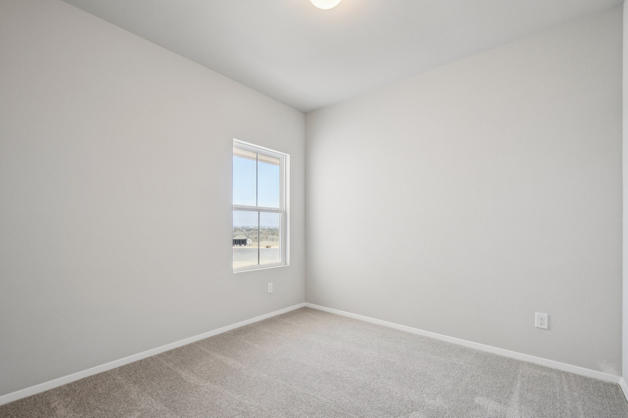 11913 Ellena Cove Austin, TX 78747 - Photo 22 of 35 an empty room with a window