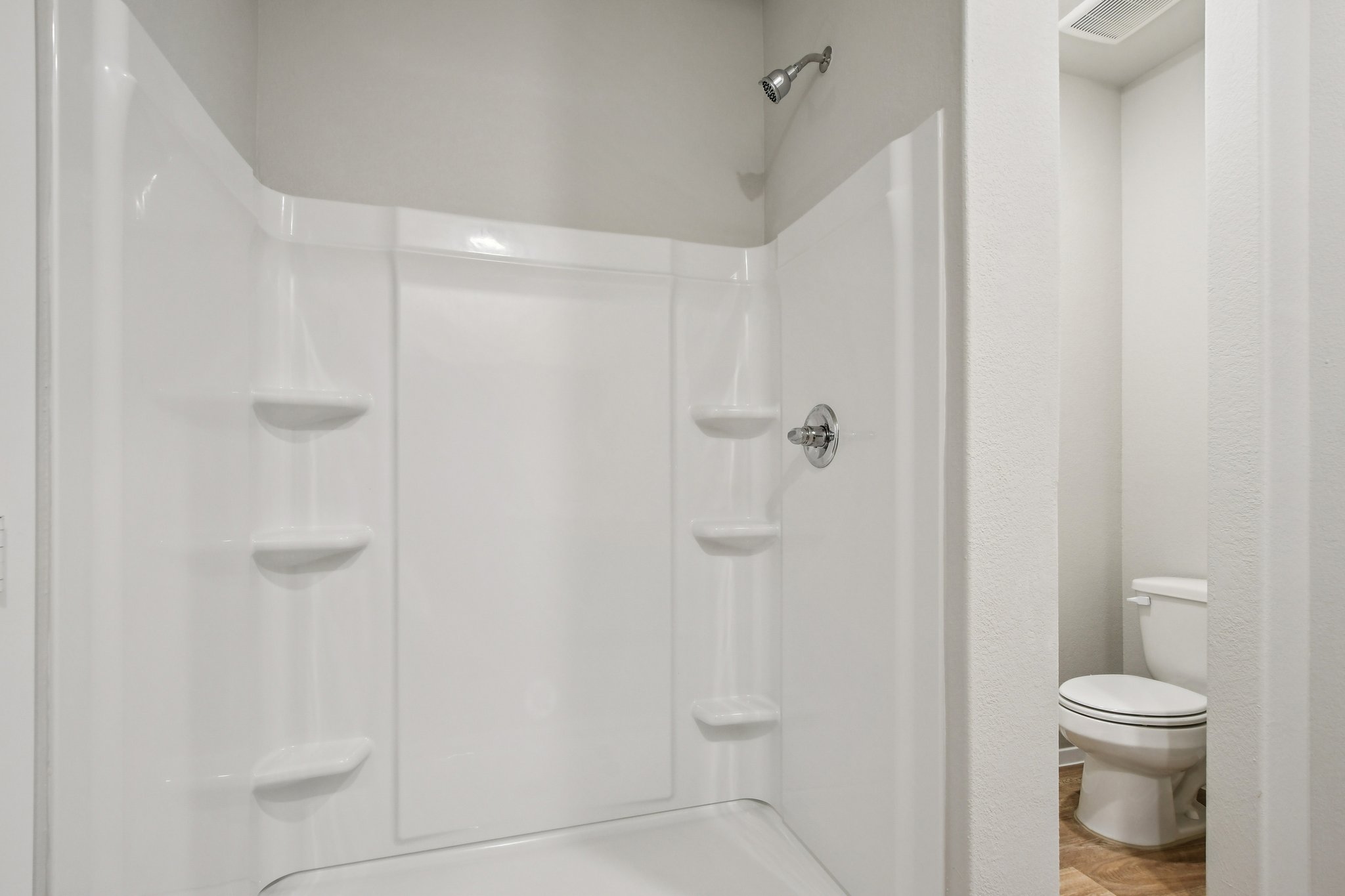 11913 Ellena Cove Austin, TX 78747 - Photo 29 of 35 a bathroom with a shower and a toilet