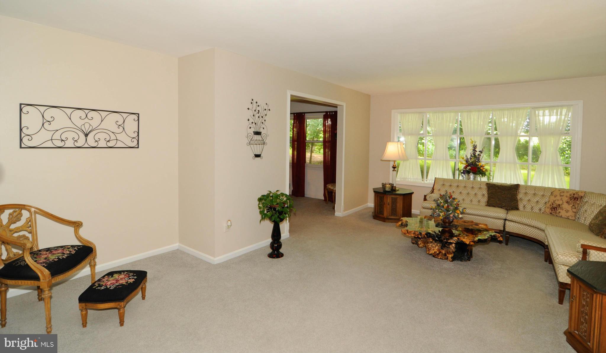 8187 Murphy Road Fulton, MD 20759 - Photo 2 of 25 a living room with furniture and a large window