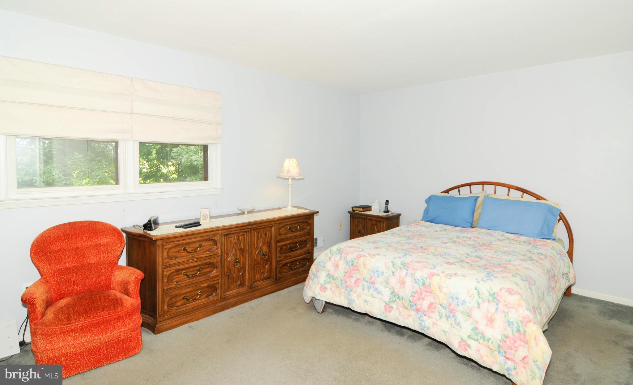 8187 Murphy Road Fulton, MD 20759 - Photo 13 of 25 a bed sitting in a room next to a window