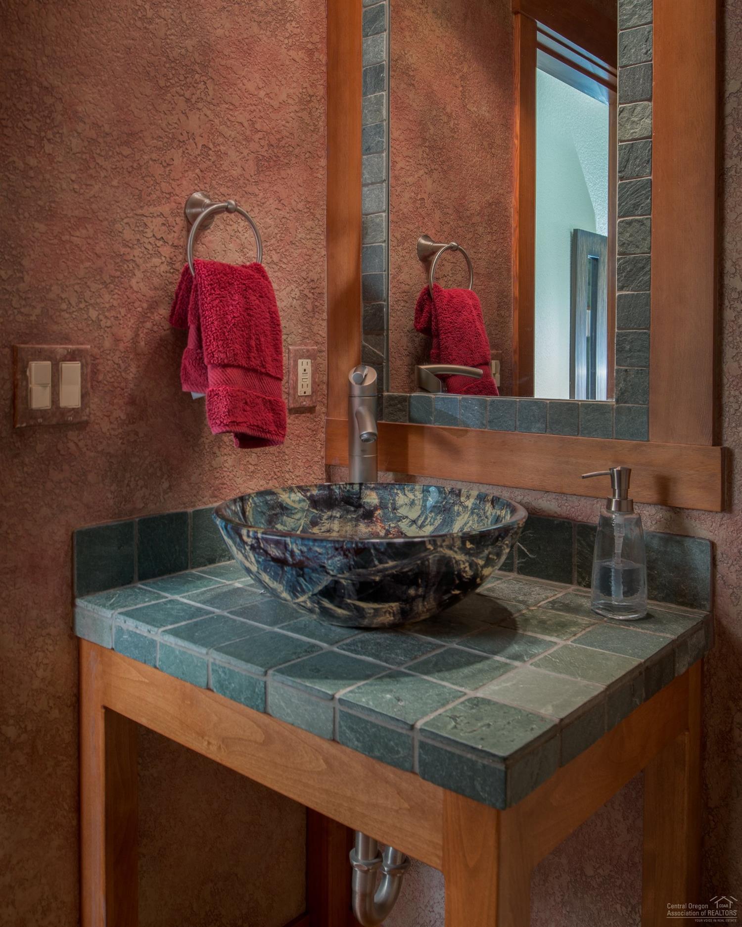 56902 River Road Sunriver, OR 97707 - Photo 15 of 24 The guest powder bath is lovely- offerin