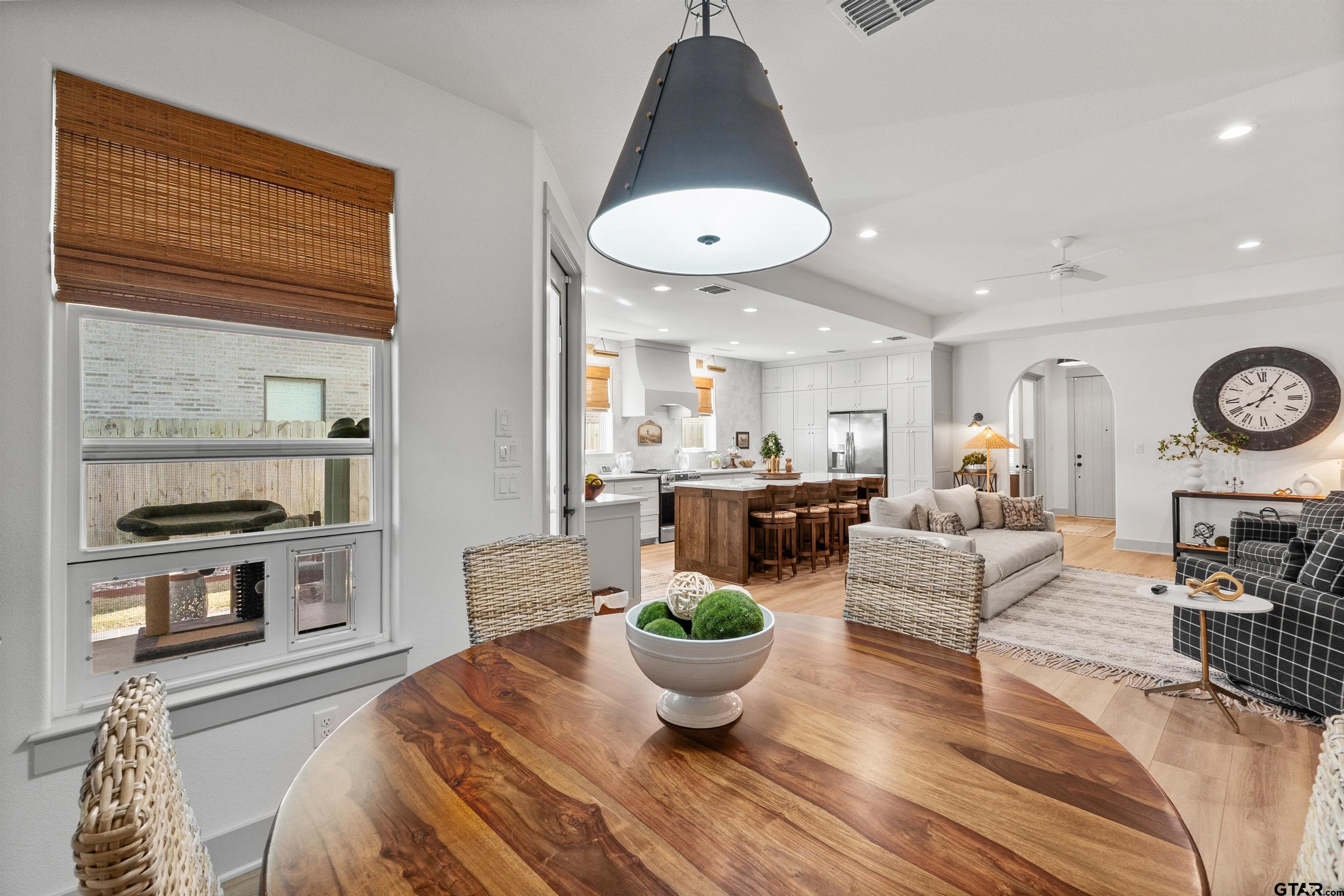 242 Kaul Lane Bullard, TX 75757 - Photo 13 of 45 a living room with furniture a window and kitchen view