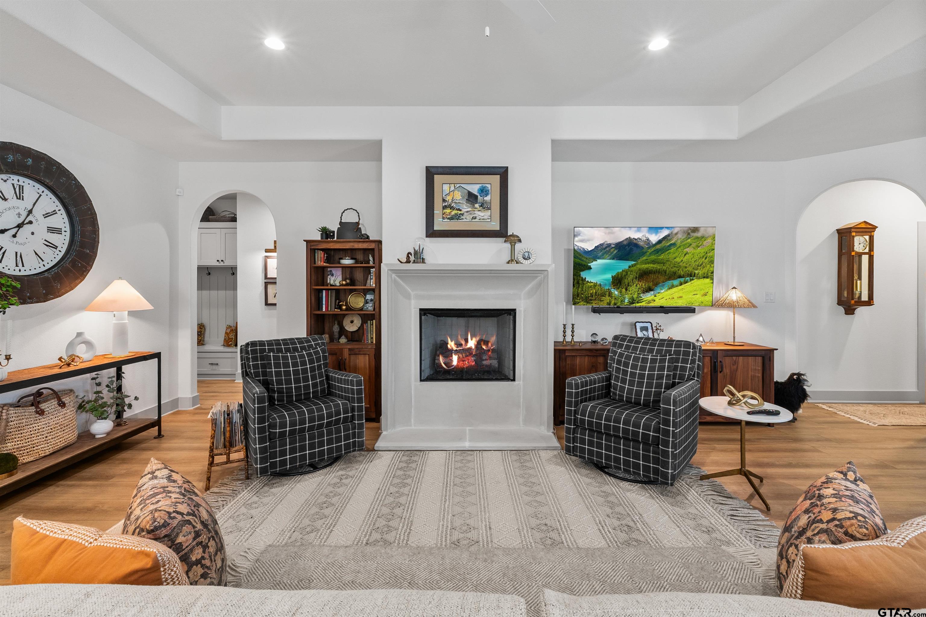 242 Kaul Lane Bullard, TX 75757 - Photo 14 of 45 a living room with furniture and a fireplace