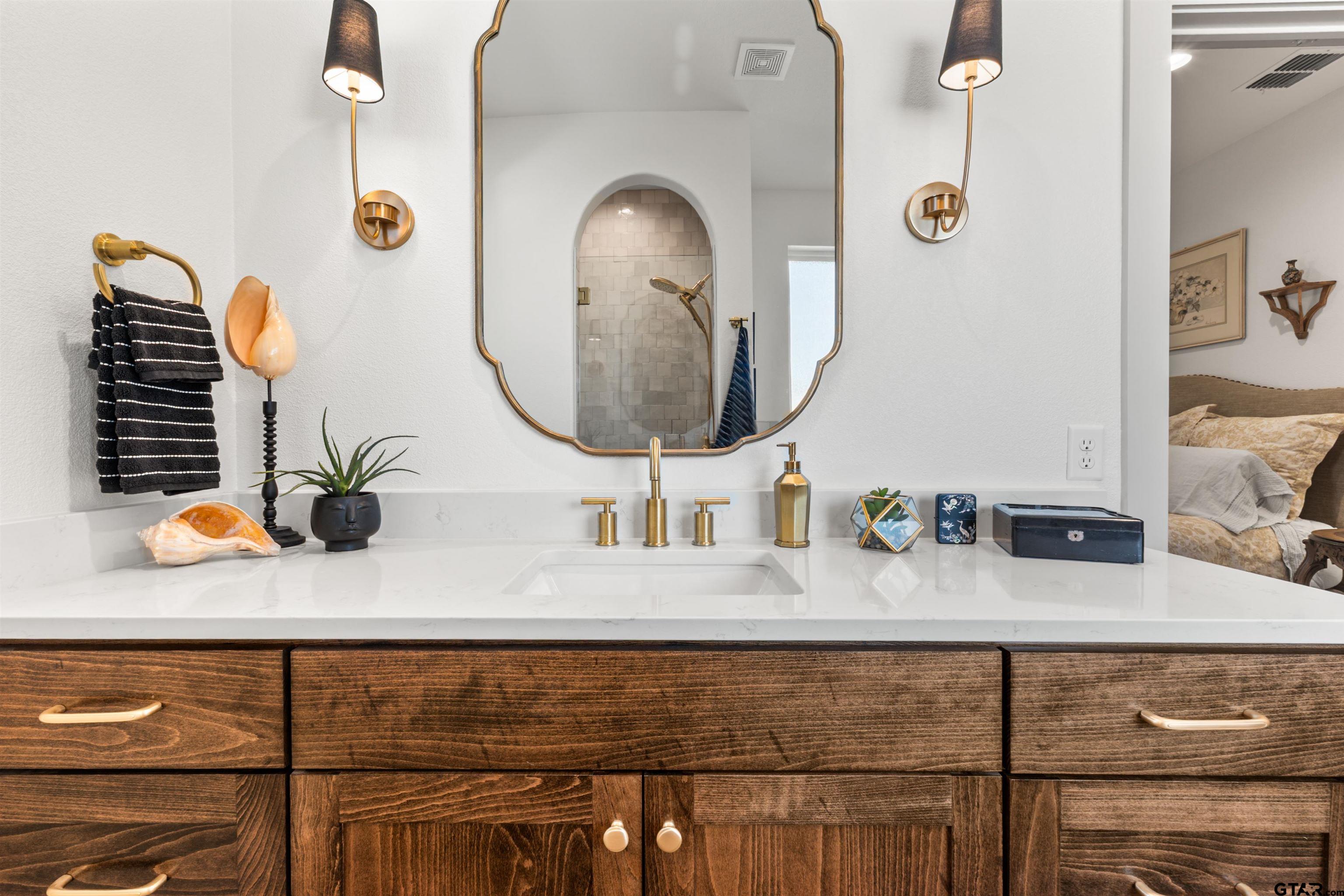 242 Kaul Lane Bullard, TX 75757 - Photo 20 of 45 a bathroom with sink and mirror
