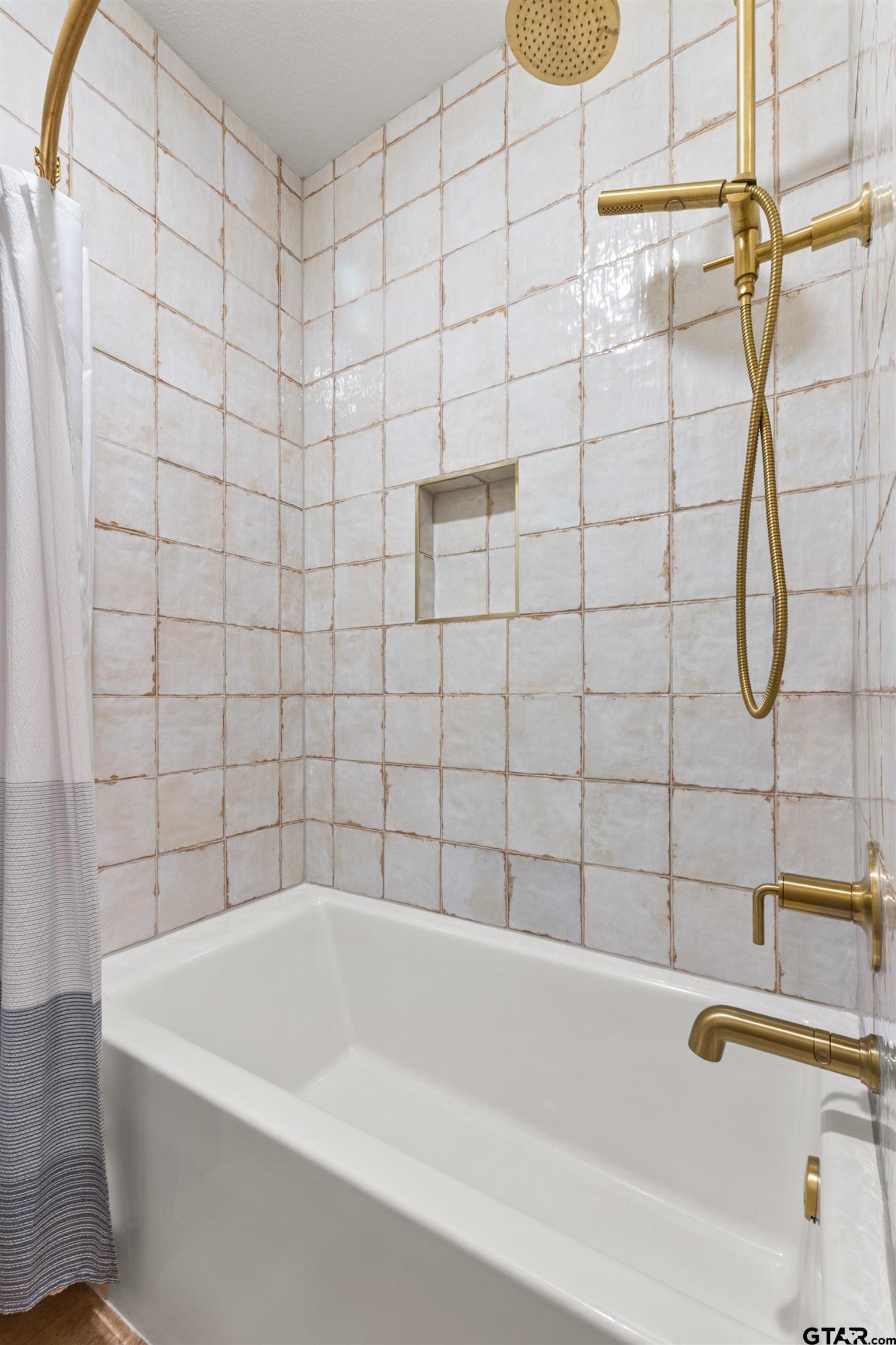 242 Kaul Lane Bullard, TX 75757 - Photo 31 of 45 a bathroom with a bath tub