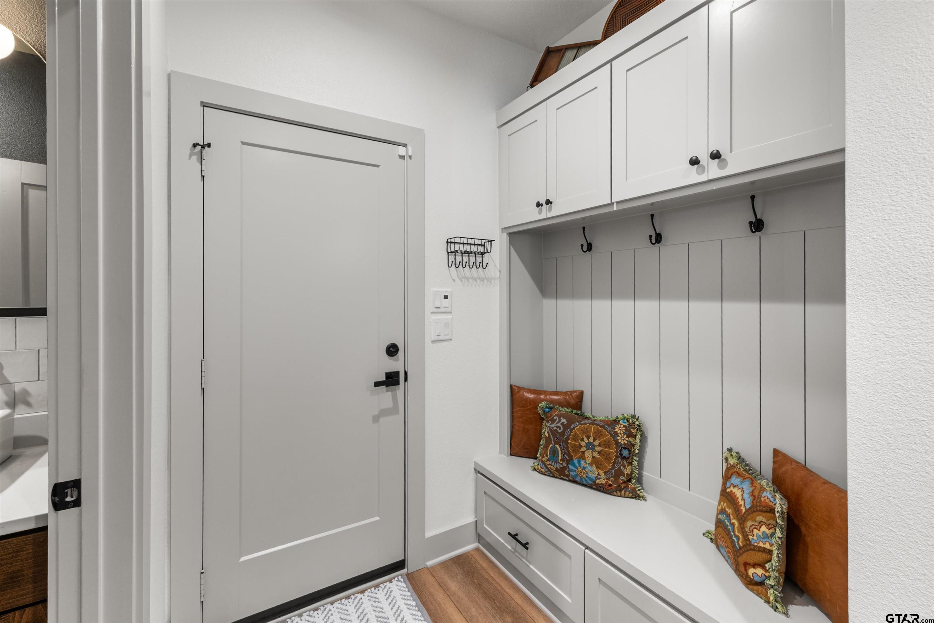 242 Kaul Lane Bullard, TX 75757 - Photo 36 of 45 a view of an entryway with wooden floor