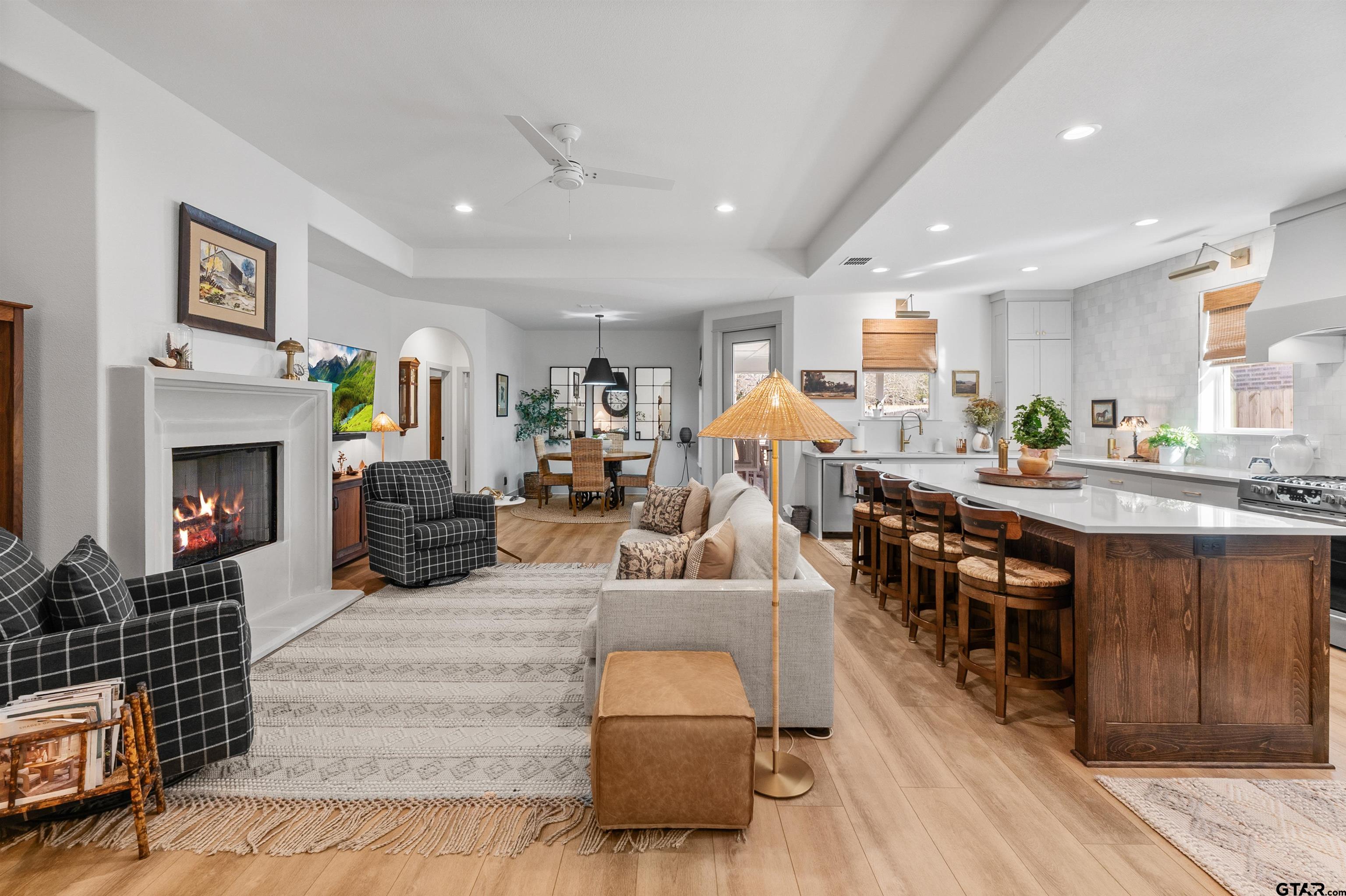 242 Kaul Lane Bullard, TX 75757 - Photo 5 of 45 a living room with fireplace furniture and a wooden floor