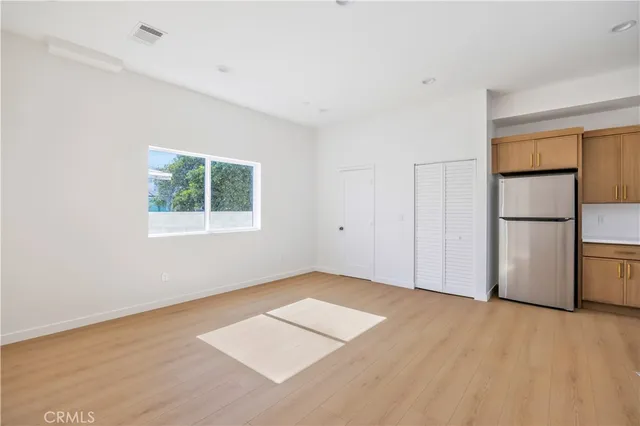 a bathroom with a shower and toilet