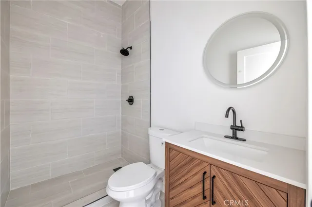 a view of a porch with a bench and a yard
