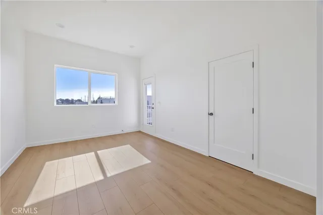 a view of a porch with wooden floor