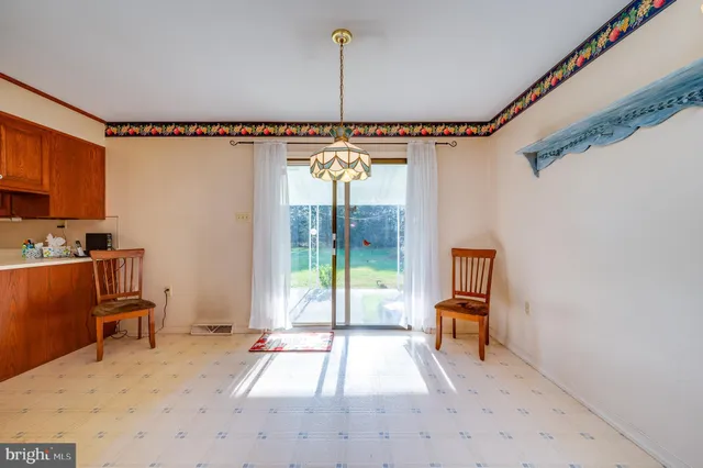 a bed room with a bed and a window