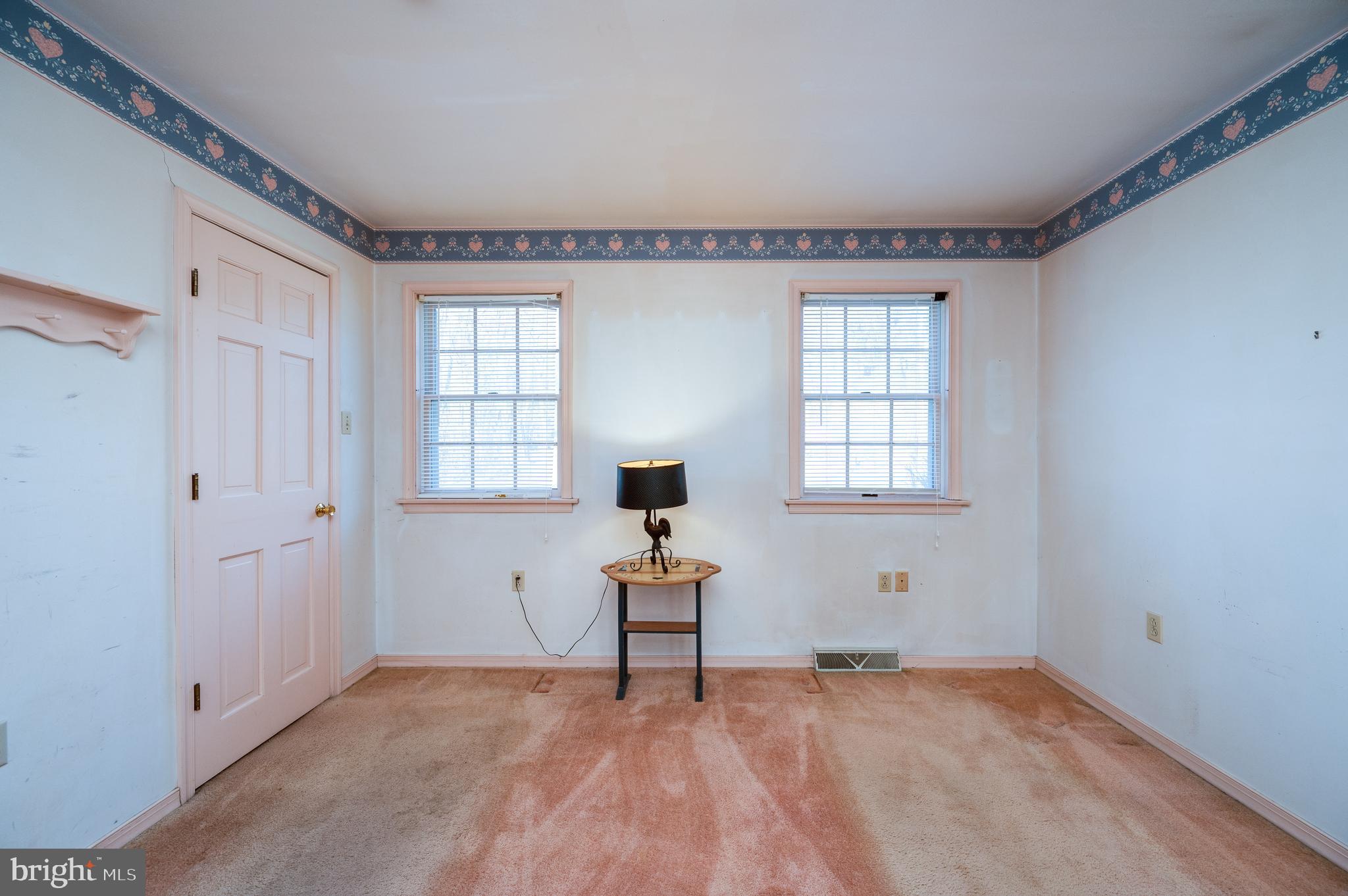 730 Texter Mountain Road Robesonia, PA 19551 - Photo 27 of 58 a view of an empty room with window and hardwood floor