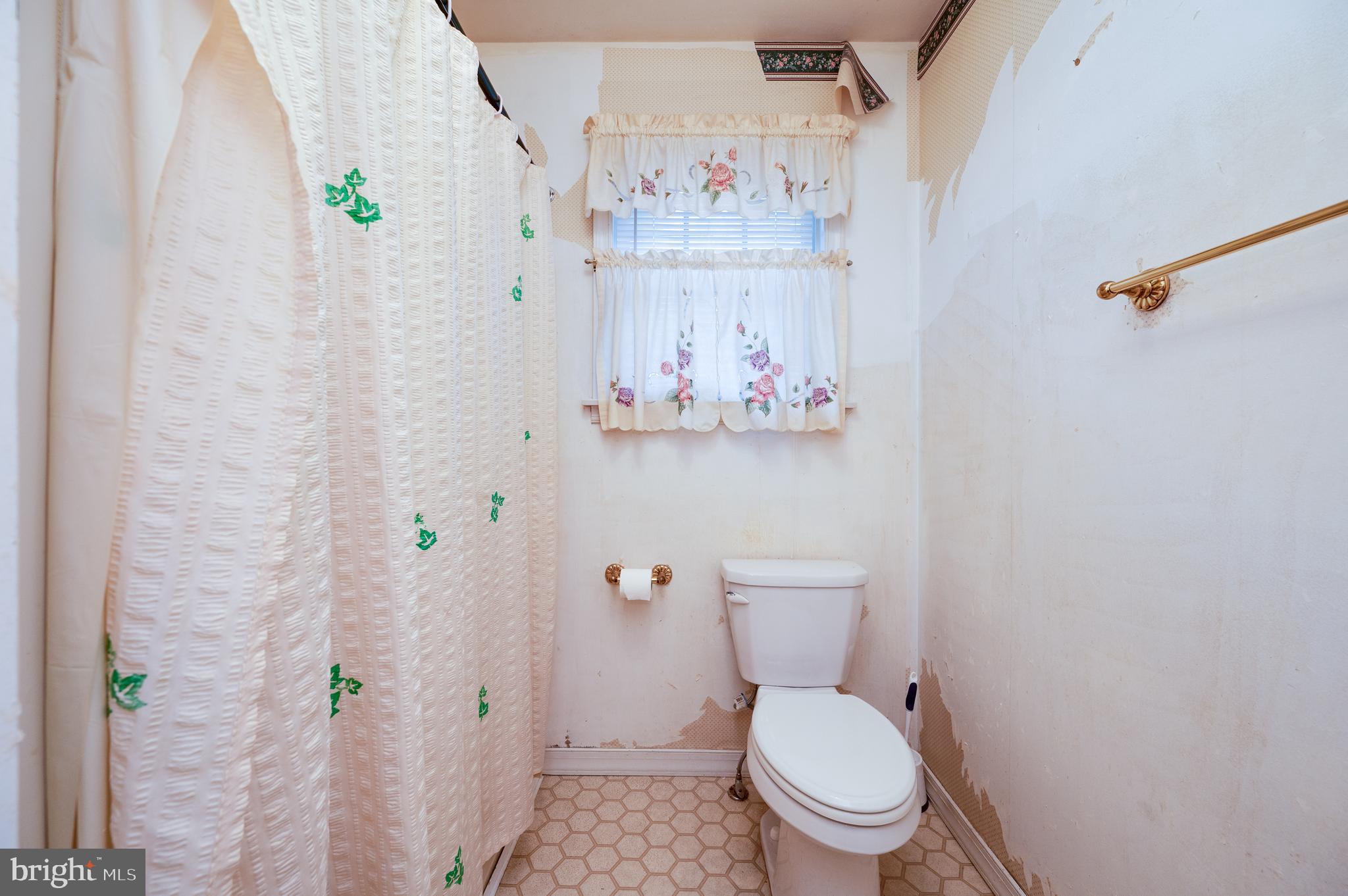 730 Texter Mountain Road Robesonia, PA 19551 - Photo 32 of 58 a white toilet sitting next to a bathroom sink