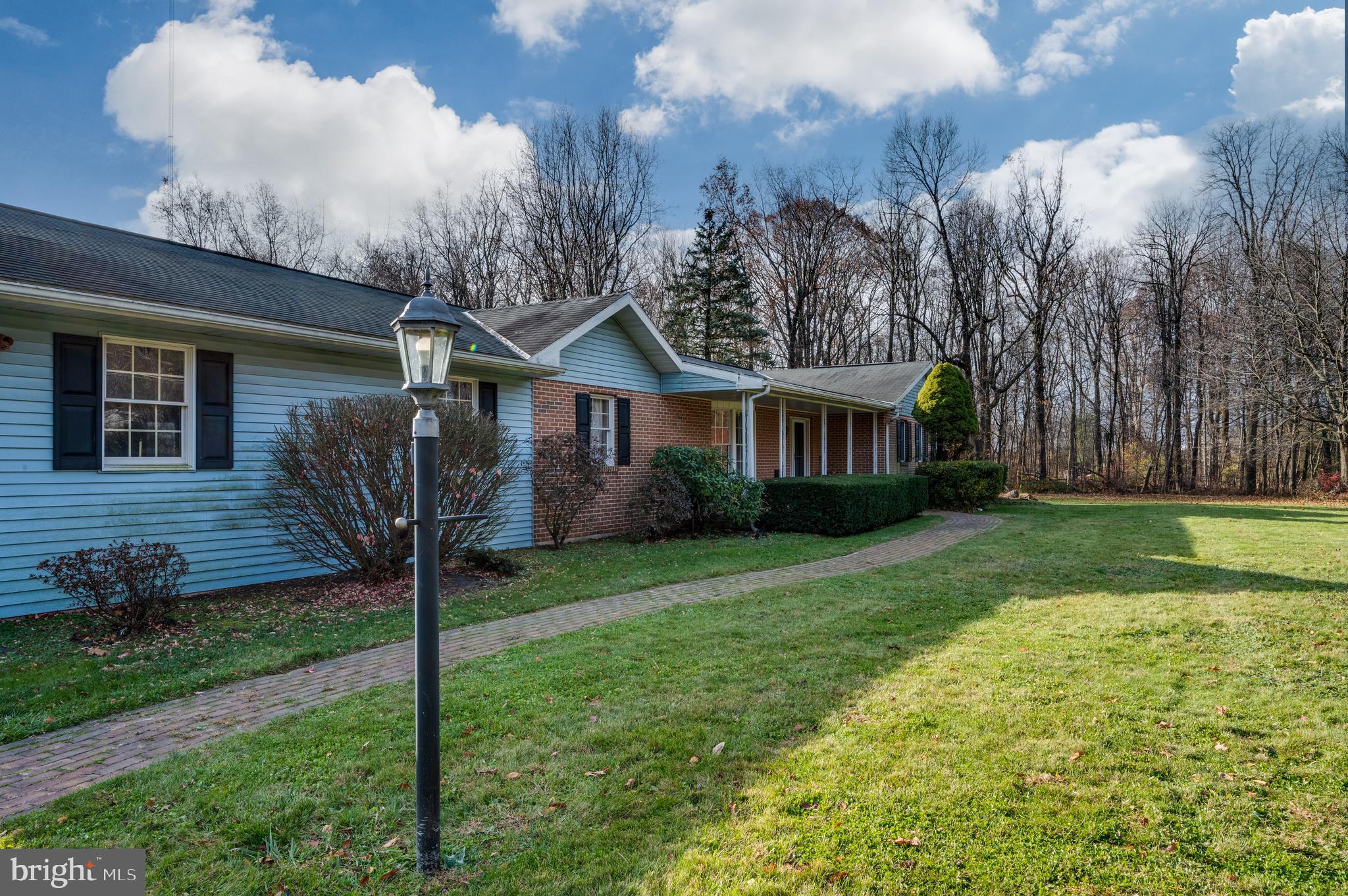 730 Texter Mountain Road Robesonia, PA 19551 - Photo 45 of 58 a view of a house with a yard