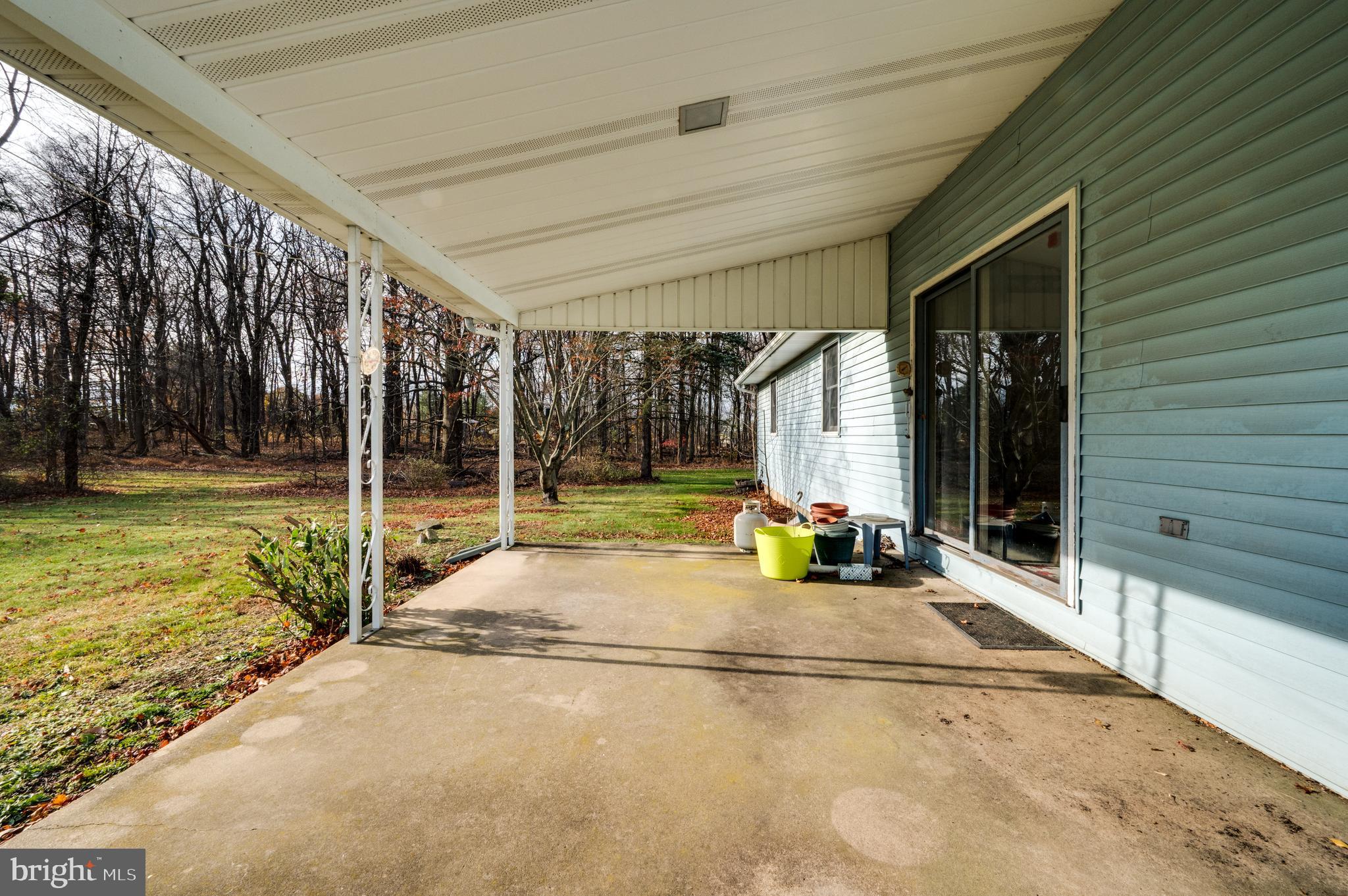 730 Texter Mountain Road Robesonia, PA 19551 - Photo 57 of 58 a view of a house with a backyard and a patio