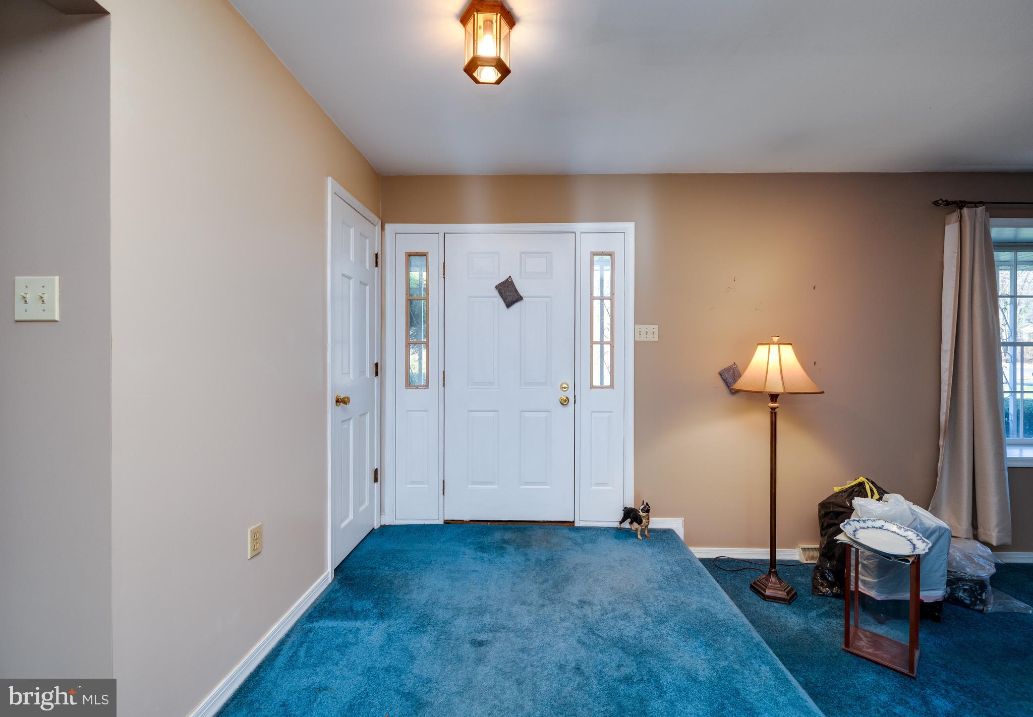 730 Texter Mountain Road Robesonia, PA 19551 - Photo 6 of 58 a view of a livingroom with hardwood floor and a ceiling fan