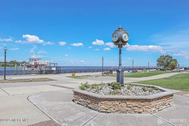 a swimming pool with an outdoor seating