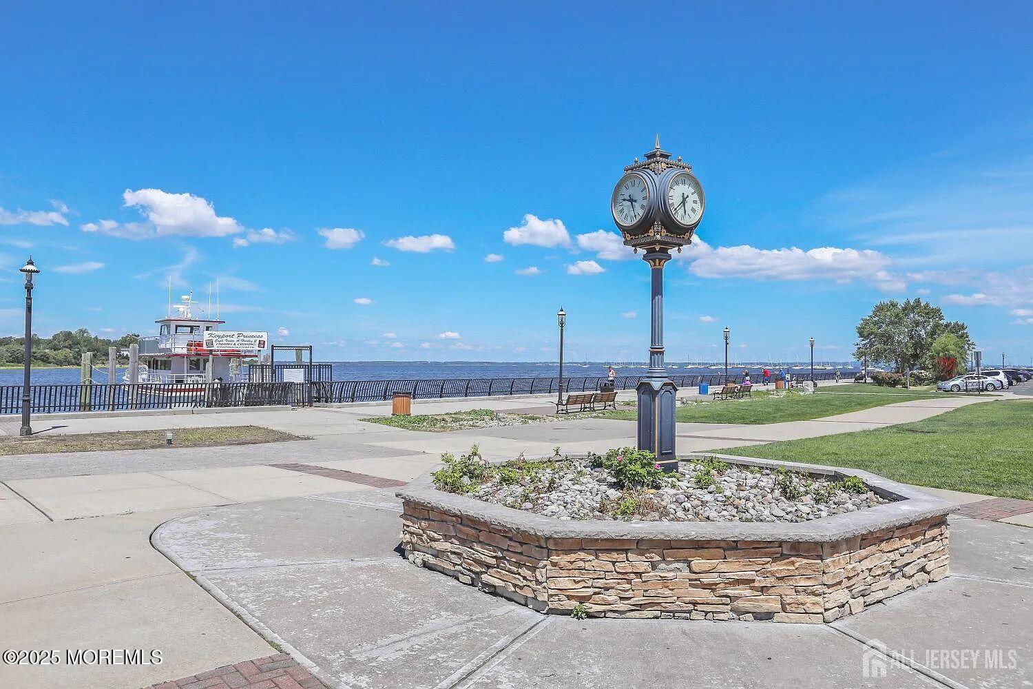 54 Main Street, Unit 2 Keyport, NJ 07735 - Photo 18 of 25 a swimming pool with an outdoor seating