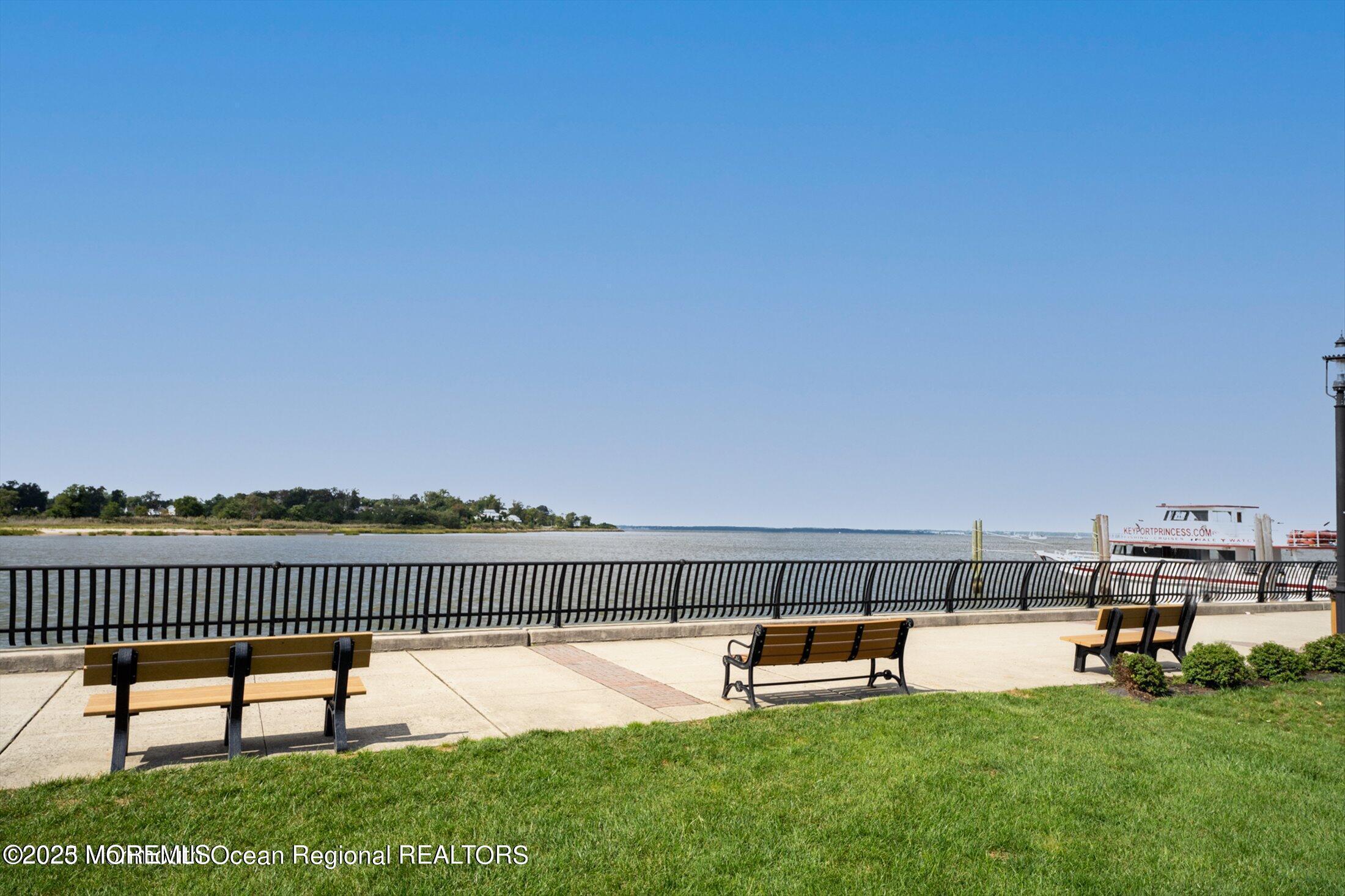 54 Main Street, Unit 2 Keyport, NJ 07735 - Photo 22 of 25 a view of a terrace with a bench